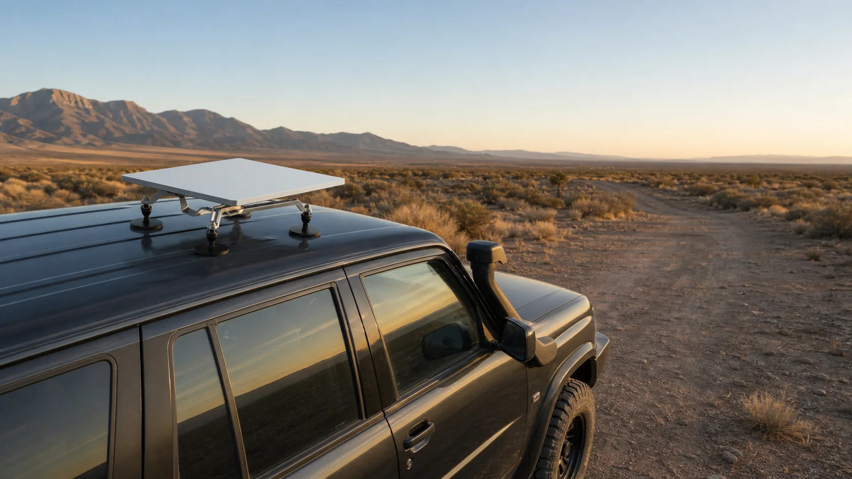 Outluma magnetic mounting system on a parked overland vehicle in the desert
